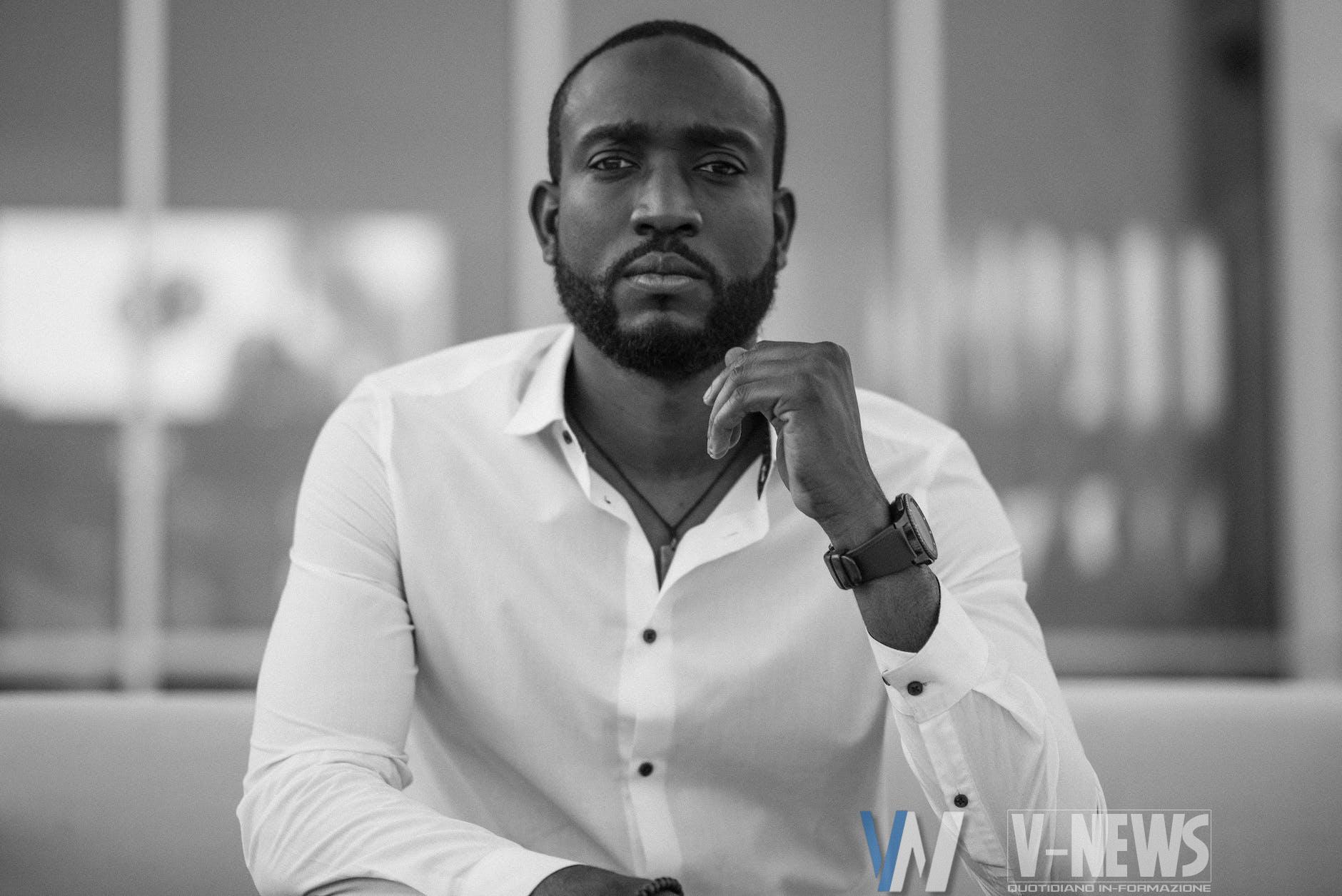 monochrome photo of man wearing white dress shirt